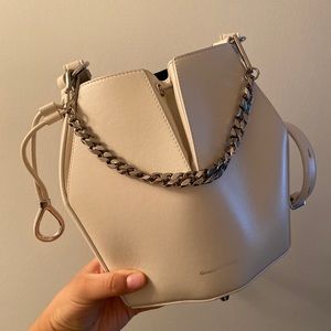 Alexander McQueen mini bucket bag. Ivory.